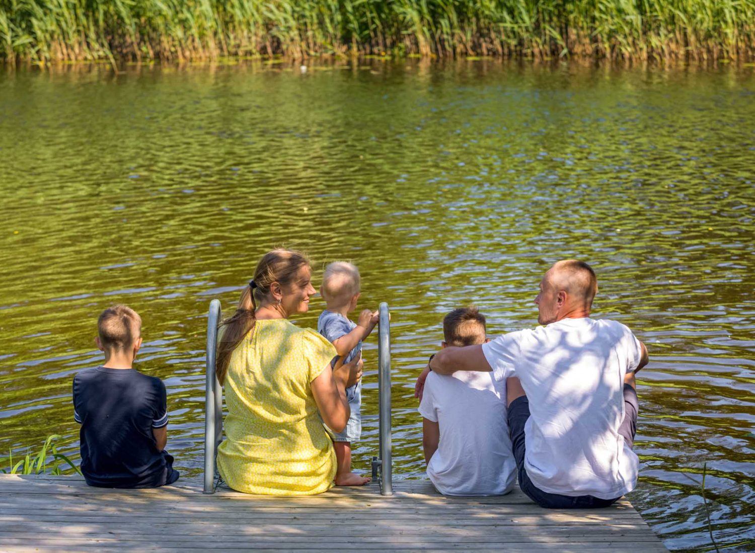 Family relaxing in Soomaa region Estonia